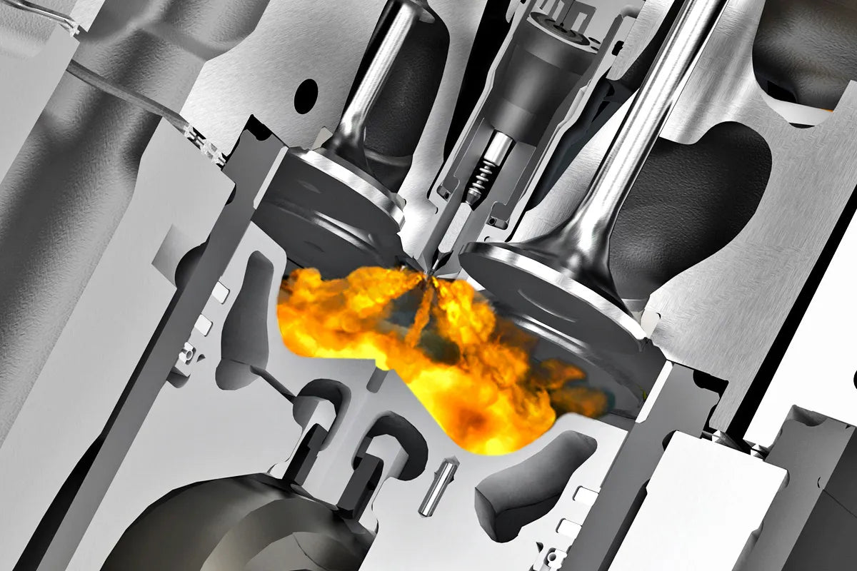 Cross-section diagram of a diesel direct injection system showing fuel spraying directly into the cylinder combustion chamber.